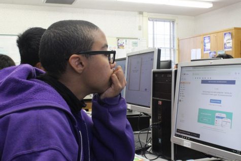 Track and field player Naamah Silcott checks her email for any notifications from her coach, following yesterdays cancellation of all athletic events by Birmingham Community Charter High School (BCCHS) in response to the Covid - 19 pandemic.