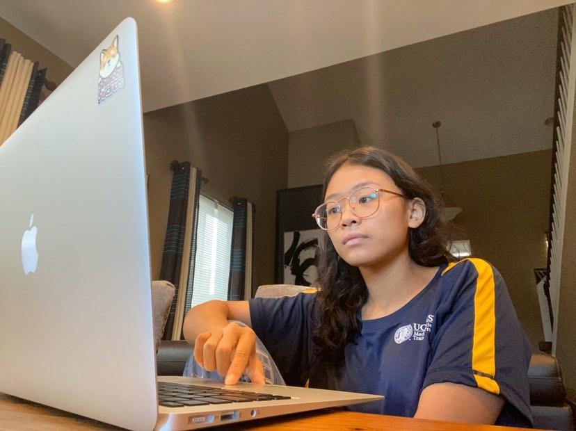 Senior Alyanna Ahorra works on her online classes during the school closure.