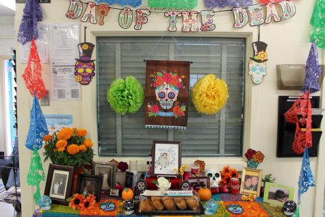 Office staff assembled and decorated a Day of the Dead altar in the main office, which brightly greets those who enter the school.