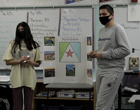 Juniors Jiselle Covarrubias and Mario Ronquillo give a presentation about the city of Merida, Mexico during Glenda Hurtado’s third period Spanish 2 class.