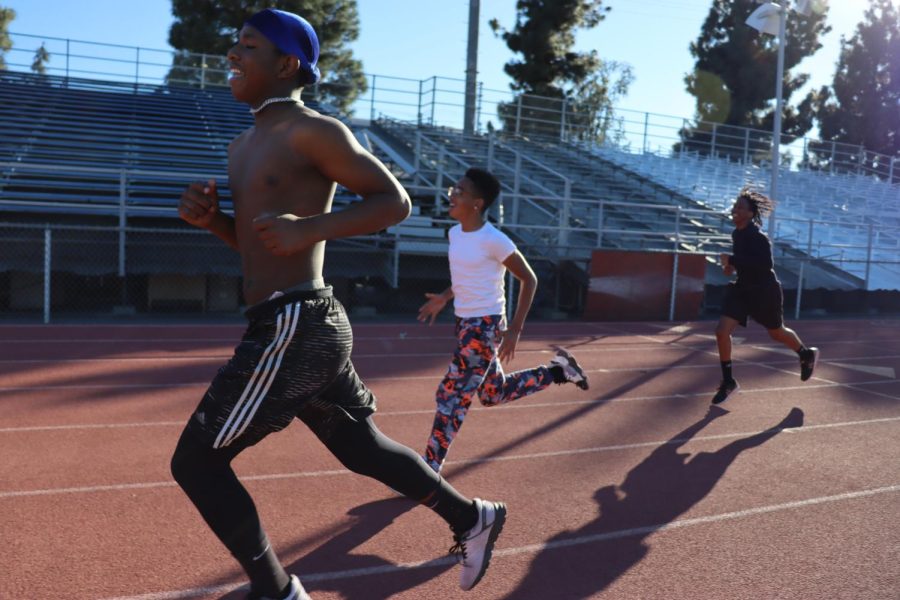 Freshman Monty Coleman outpaces his teammates during Birmingham Community Charter High Schools varsity track and field practice.