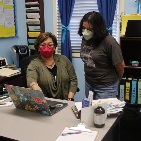 Counselor Martina Torres works with students in her office on March 21. On March 23 juniors will take the SAT, which will be experiencing changes in the coming years.