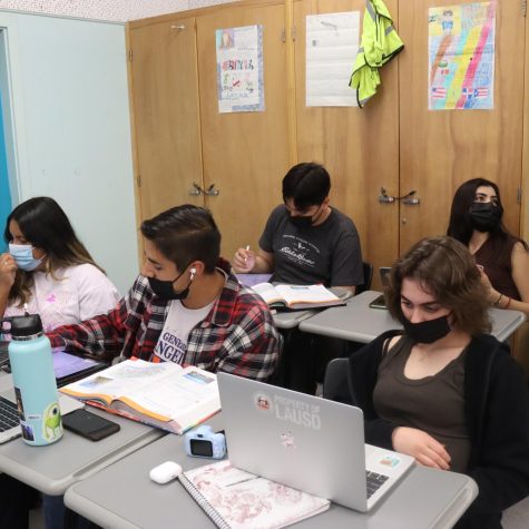 Students work independently, while wearing masks, during third period Spanish 3 on March 22. 
