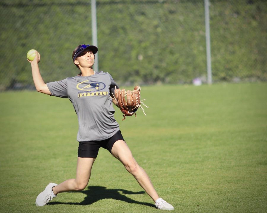 Varsity outfielder Danielle Gonzalez fields a pop-fly during softball practice at Birmingham Community Charter High School.
