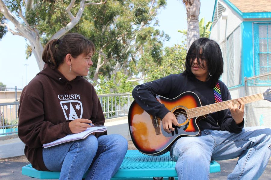 Sophomores Valeria Negev and Khalel Gillen, both of whom have more than a year of songwriting experience, practice the techniques they learned from weekly Songwriting Club meetings sponsored by music teacher Wes Hambright. (My music) used to be very chaotic, Gillen said. Now its like in a nice package.