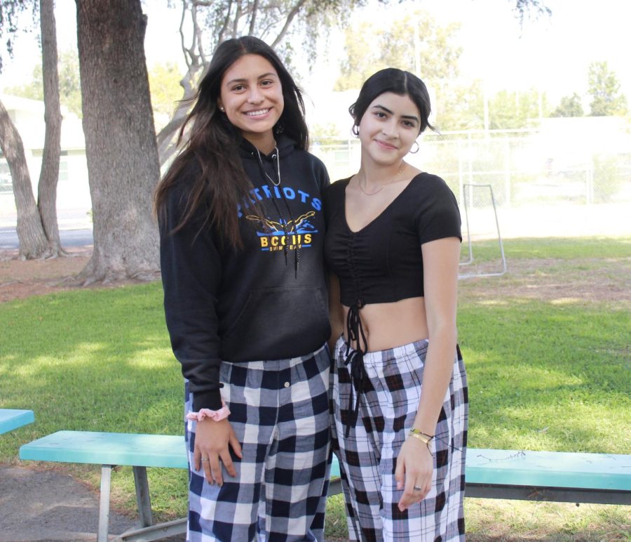 Junior Brisa Chajan and senior Jiselle Covarrubias wear pajama pants on Pajama Day during Spirit Week.