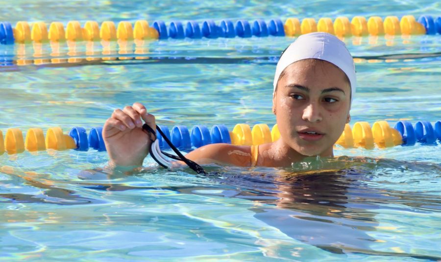 Junior Brisa Chajan does eggbeater drills durring water polo practice on Nov. 4. This is Chajanss first year on water polo, she previously swam on the varsity team.
