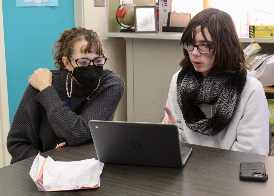 School social worker Joanne Tuell advises senior Dashell Caloroso during a senior workshop on Nov. 9, where student were assisted by staff members on the application process.  