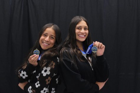 Sisters Brisa and Katherine Chajan show off their Los Angeles CIF Water Polo Championship medals on Feb. 28. The Birmingham Community Charter High School girls water polo team beat Palisades Charter High School 19-11 on Feb. 16.

