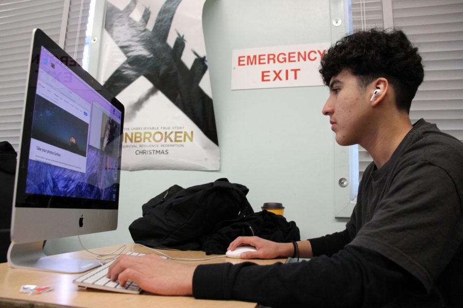 Junior Leo Ordonez works on a project in video production class on Feb. 27.