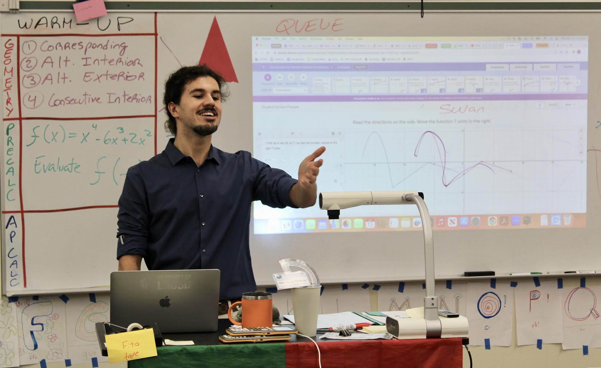 Math teacher Gonçalo Sousa teaches his precalculus class during period 3 on Sept. 13.