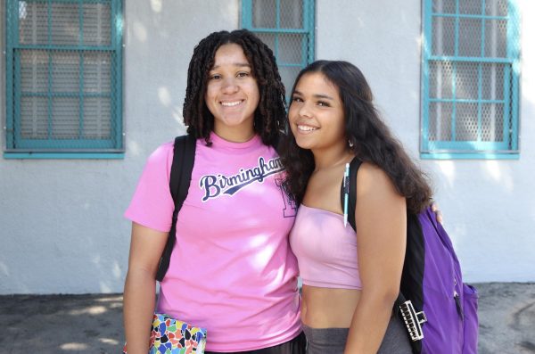 Freshmen Andrea Arosemena and Ava Weinstein represent their class by wearing pink for Color Wars on Sept. 8.