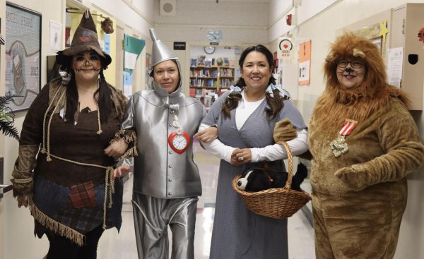 School Administrative Assistant Jennifer Miranda, School Supervision Aide Martha Vargas, Counselor Martina Torres and Office Tech Lupe Osorio dress as characters from The Wizard of Oz.