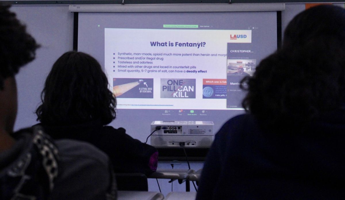 Students in English teacher Christopher McAdamis fourth period Honors English class listen to a schoolwide fentanyl abuse assembly over Zoom on Nov. 14.