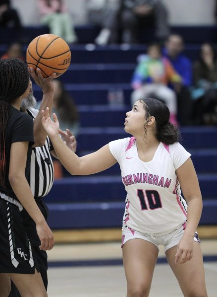 Freshman Ava Weinstein gets ready to grab the basketball seconds before the start of the junior varsity girls basketball game at Birmingham Community Charter High School on Jan. 22. The game was played and won against Granada Hills Charter High School with a score of 63-34. 