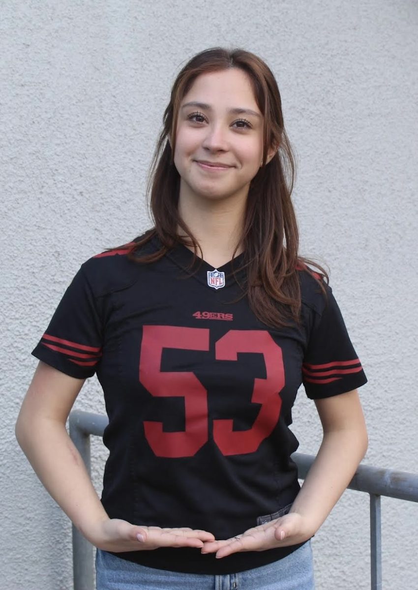 Senior+Alejandra+Iniguez+shows+her+team+spirit+in+her+San+Francisco+49ers+jersey.+Iniguez+is+excited+to+watch+her+team+at+the+Super+Bowl+along+with+the+halftime+performance+on+Feb.+11.+