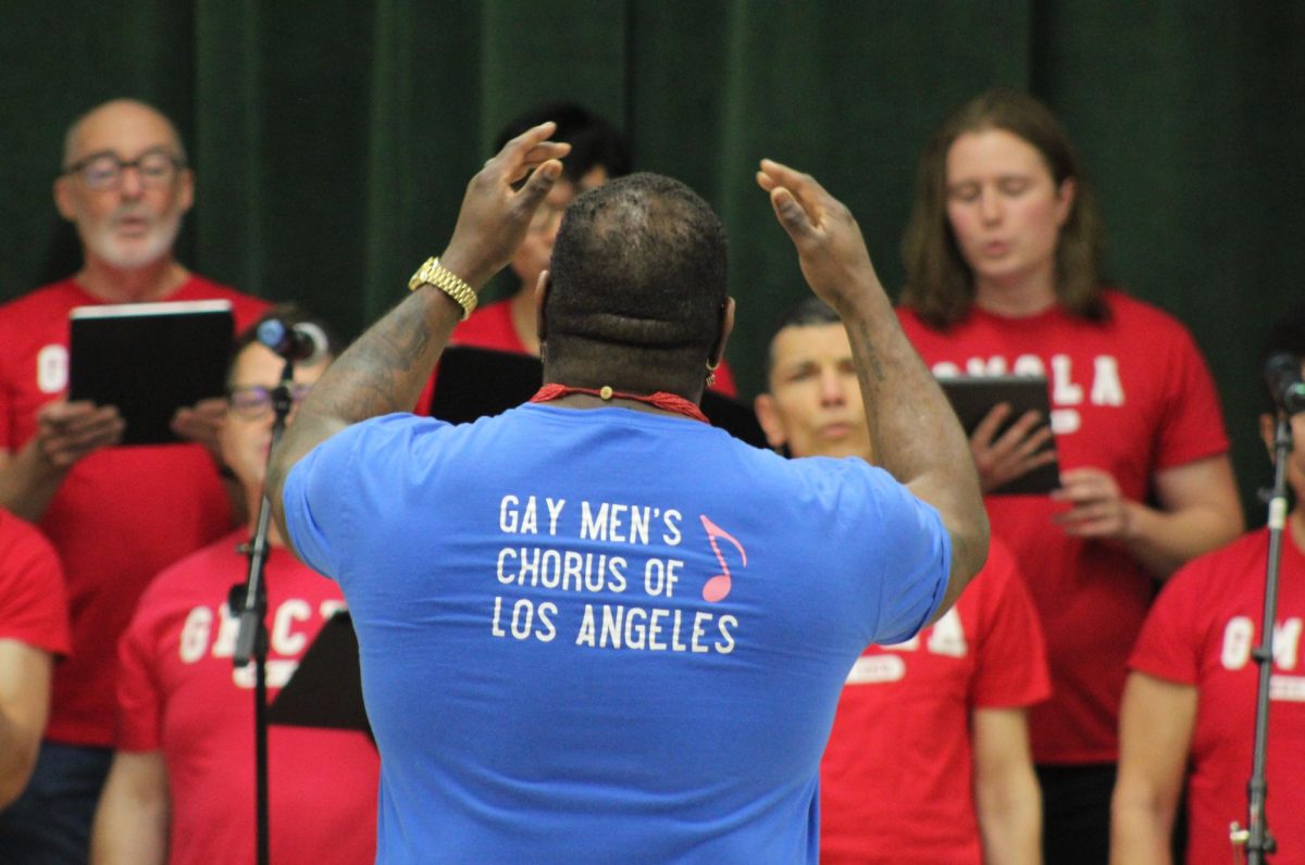 Musical director Ernest Harrison conducts the Gay Mens Chorus of Los Angeles during their concert in the MPR on April 12.