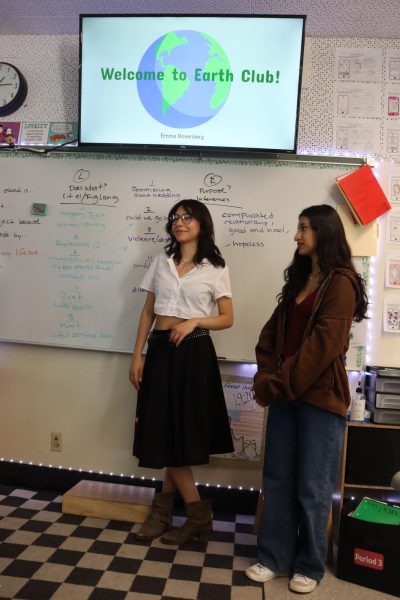 Vice President Alia Galvan and President Emma Rosenberg hold a presentation for Earth Club on April 3. The presentation was about what the club could do in the future such as school clean-ups and adding planters school wide. 