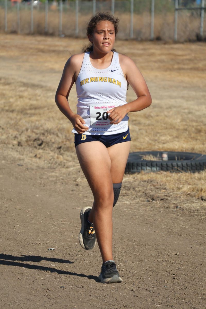 Freshman Camila Serrano runs in the Girls Varsity 3-mile race during the Second West Valley League Cluster Meet at Pierce College on Sept. 25. Serrano is a cross country runner at Birmingham Community Charter High School, in which she finished the race in 24th place with a time of 26 minutes and 12 seconds.