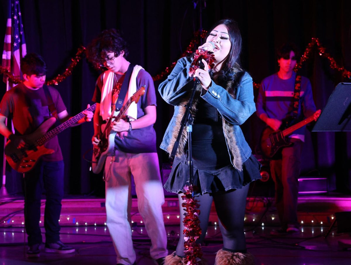 Senior Marcelo Vera-Suarez, junior Linus Bossardt and seniors Delilah Trujillo and Sebastian Olfatmanesh perform "Decode" by Paramore during period 4 rehearsals on Feb. 17