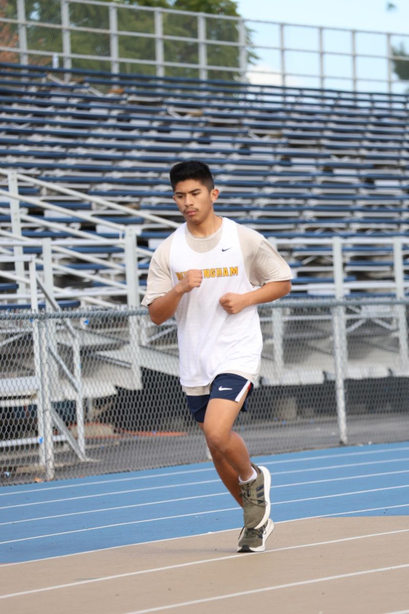 Sophomore Aaron Carrillo Otero runs on the track at Birmingham Community Charter High School on Feb. 13.