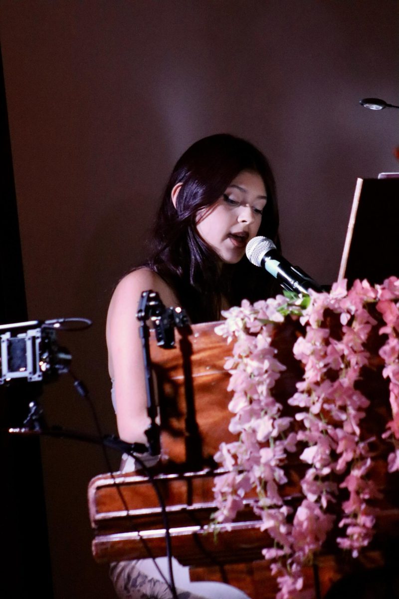Junior Marina Nelson sings "Older" by Sasha Sloan during the Spring Concert on May 19.