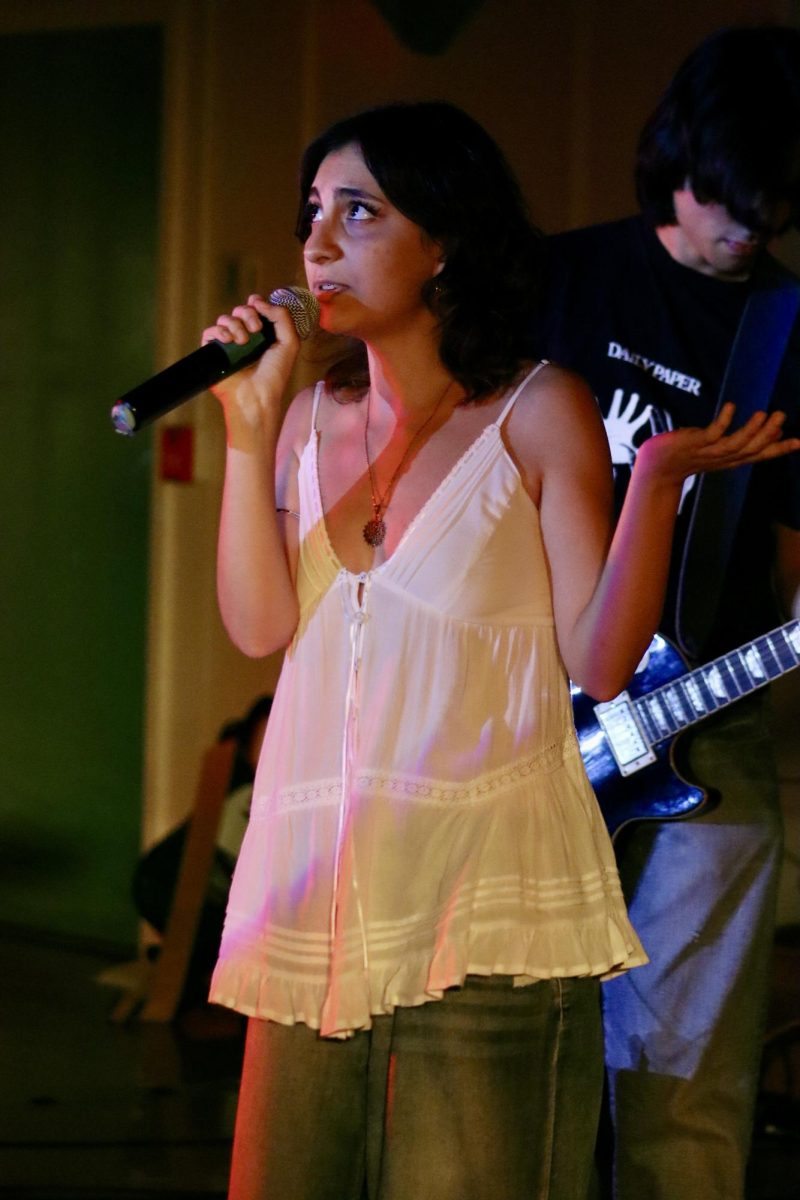 Senior Diana Abgaryan sings "Good Times Bad Times" by Led Zeppelin during the Spring Concert on May 19.
